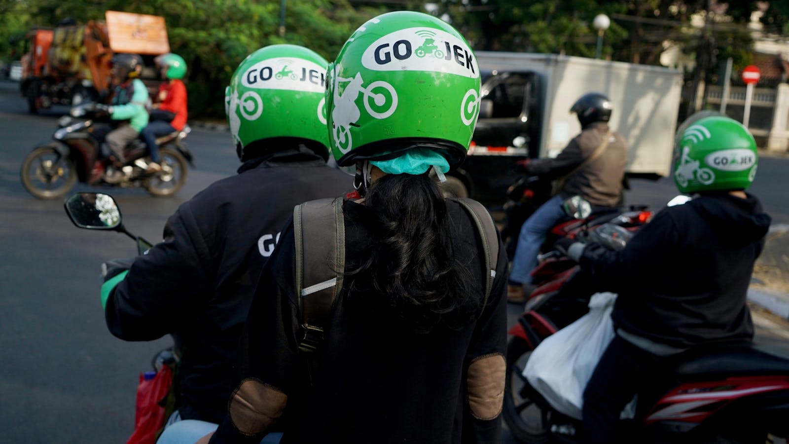 Go-Jek motorbike drivers and riders in Jakarta. Photo: Bloomberg
