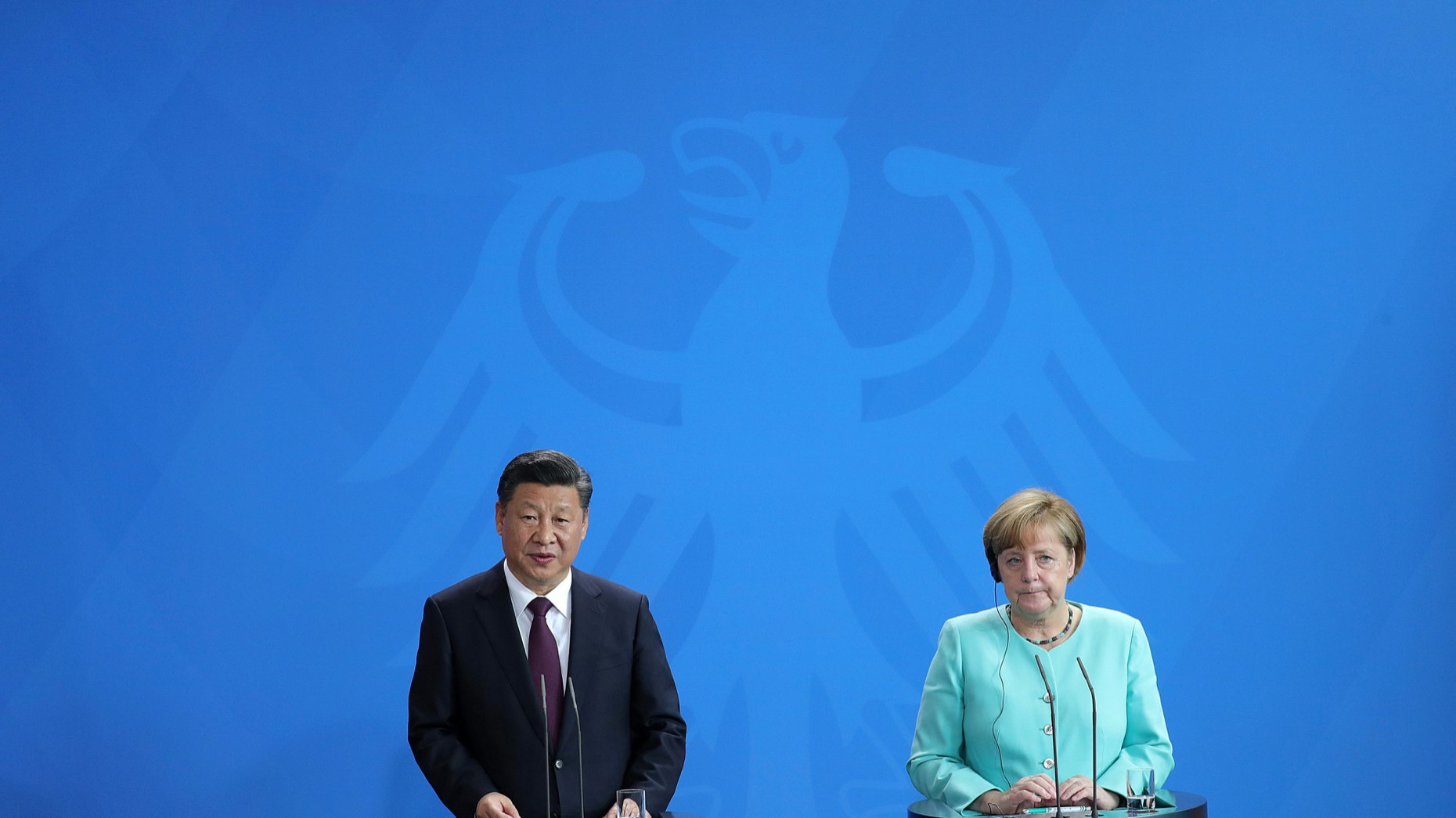 China's President Xi Jinping and German chancellor Angela Merkel in Berlin in July. Photo by Bloomberg