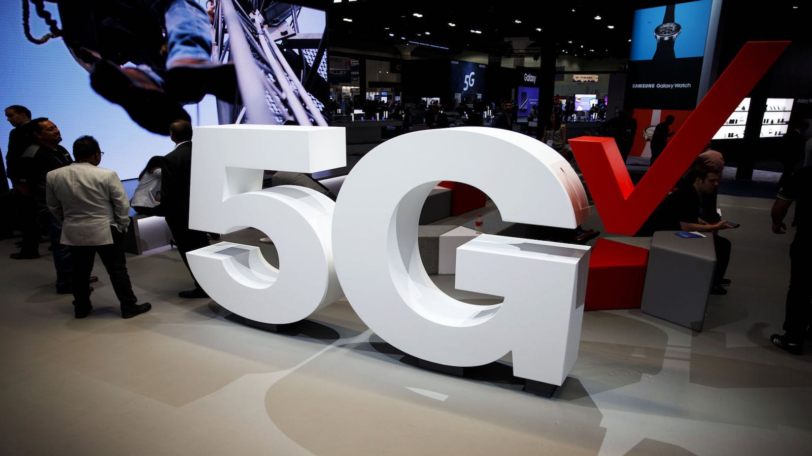 A 5G sign at a Verizon company booth during a 2018 telecoms industry conference in Los Angeles. Photo by Bloomberg.