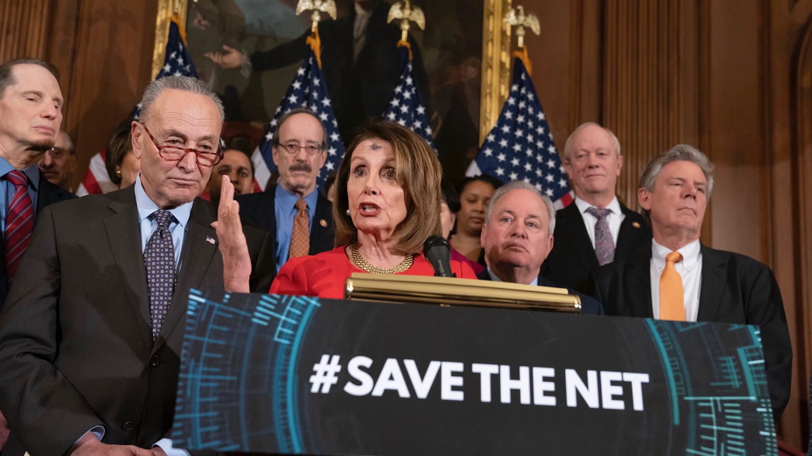 House Speaker Nancy Pelosi and Senate Minority Leader Chuck Schumer unveil the Save the Internet Act earlier in March. Photo by AP.