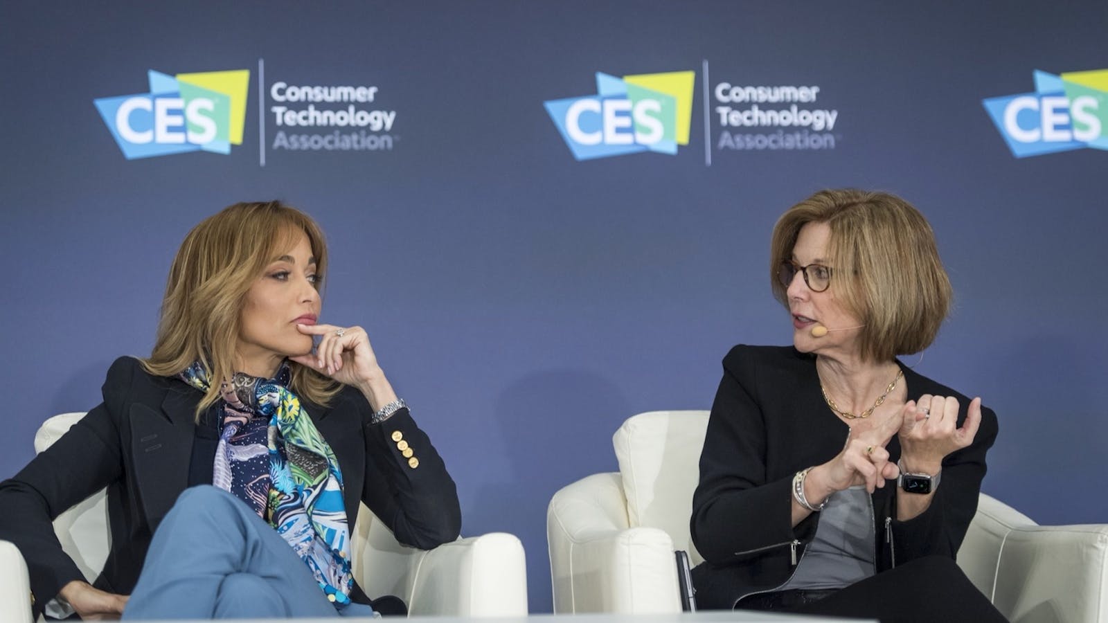 Erin Egan, chief privacy officer at Facebook, left, listens as Jane Horvath, senior director of global privacy at Apple, speaks during a panel discussion at CES. Photo by Bloomberg.