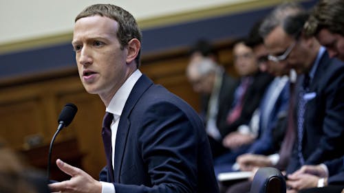 Facebook CEO Mark Zuckerberg testifying before Congress last October. Photo by Bloomberg