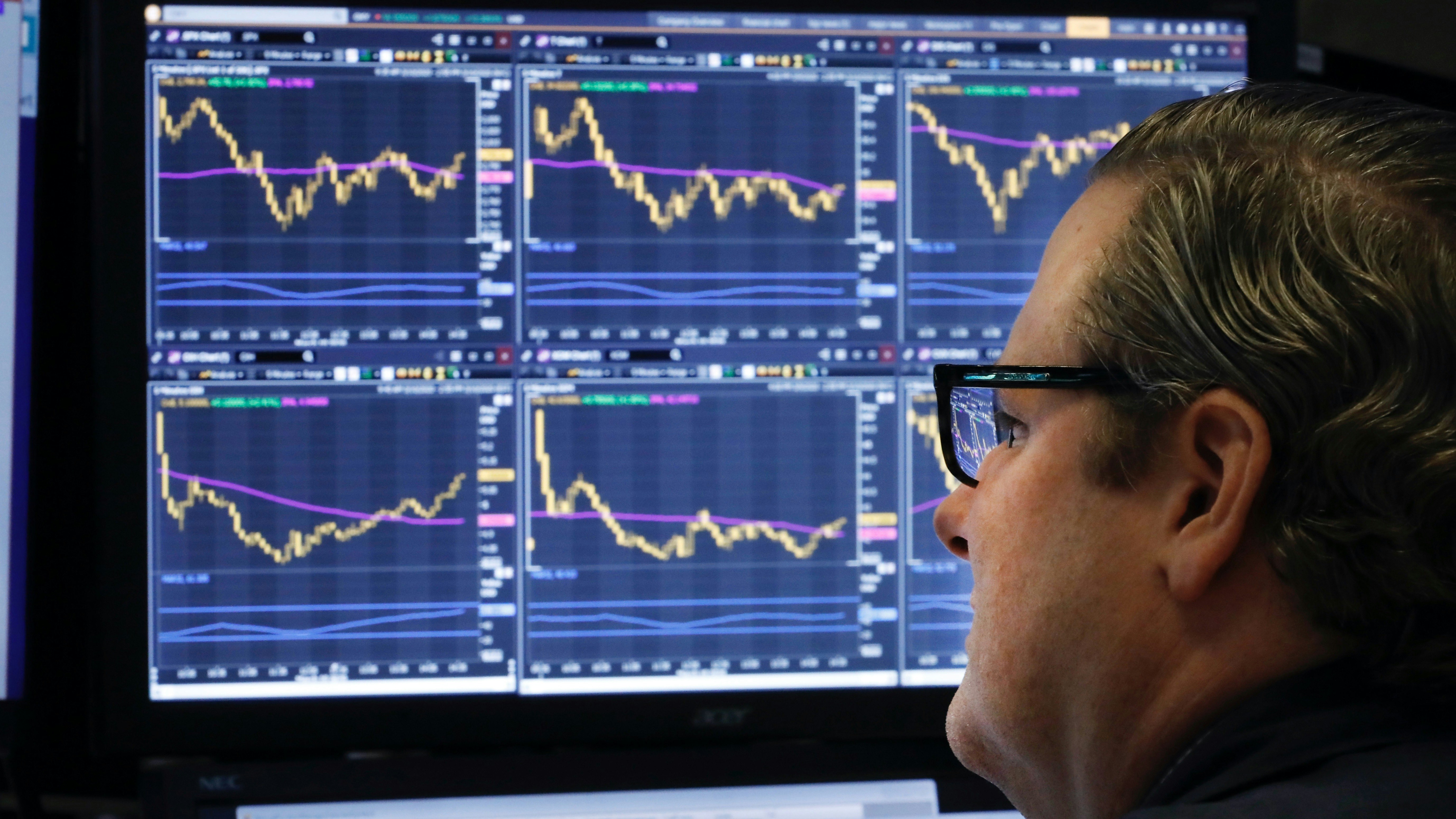 A trader on the floor of the New York Stock Exchange on Tuesday. Photo by AP