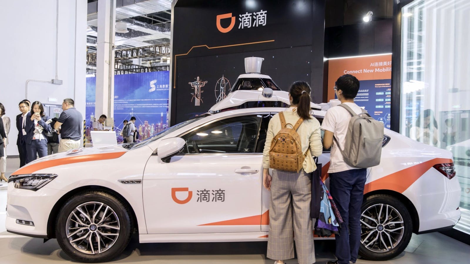 Attendees looked at a Didi autonomous vehicle at the World Artificial Intelligence Conference in Shanghai in August. Photo: Bloomberg