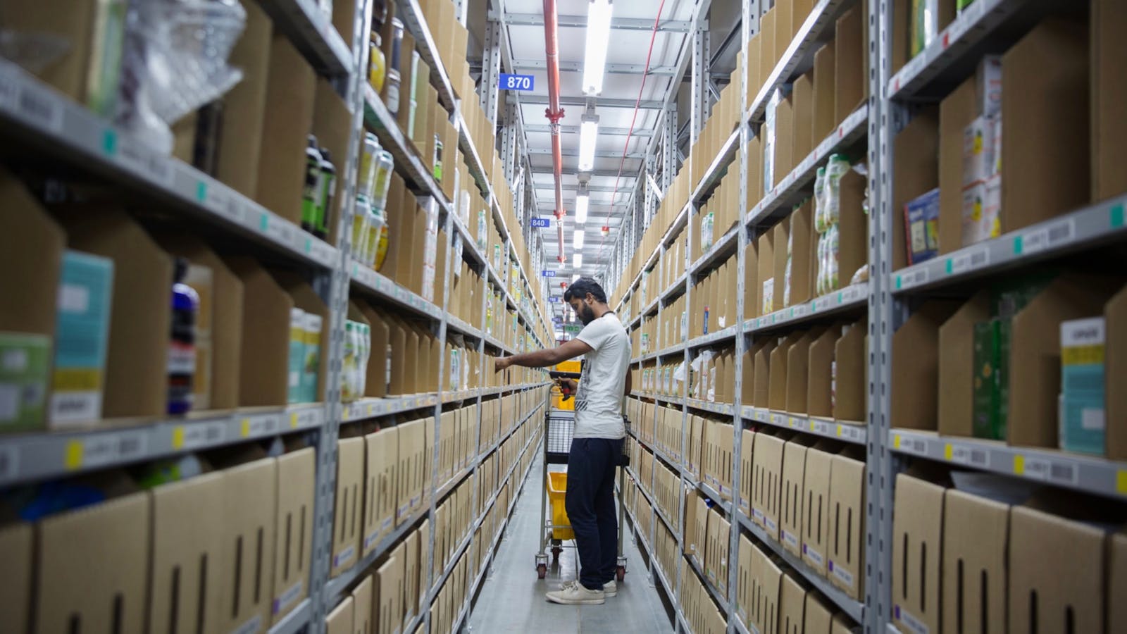 An employee worked at an Amazon warehouse in Bangalore, India, in 2018. Photo: Bloomberg