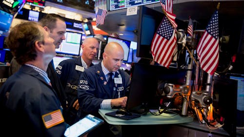 Traders on the floor of the New York Stock Exchange last June. Photo by Bloomberg