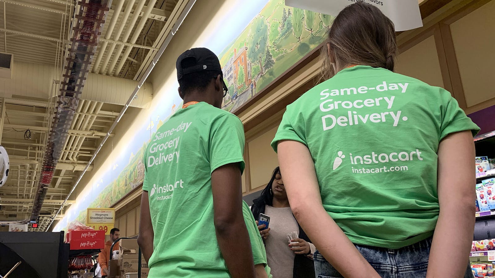 Workers from Instacart at a grocery store in Frederick, Maryland, last year. Photo: AP