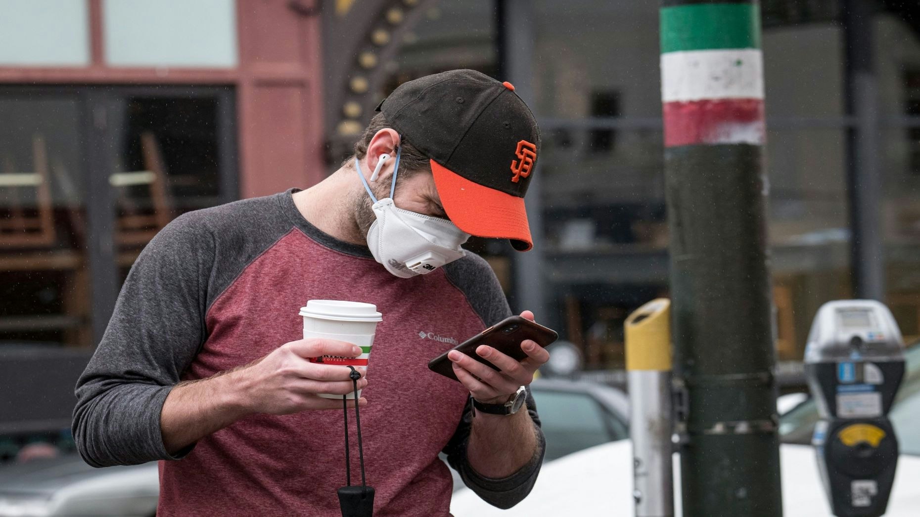 A person wearing a protective mask in San Francisco on May 14, 2020. States are easing some coronavirus restrictions and tech companies are slowly planning a return to work. Photo: Bloomberg