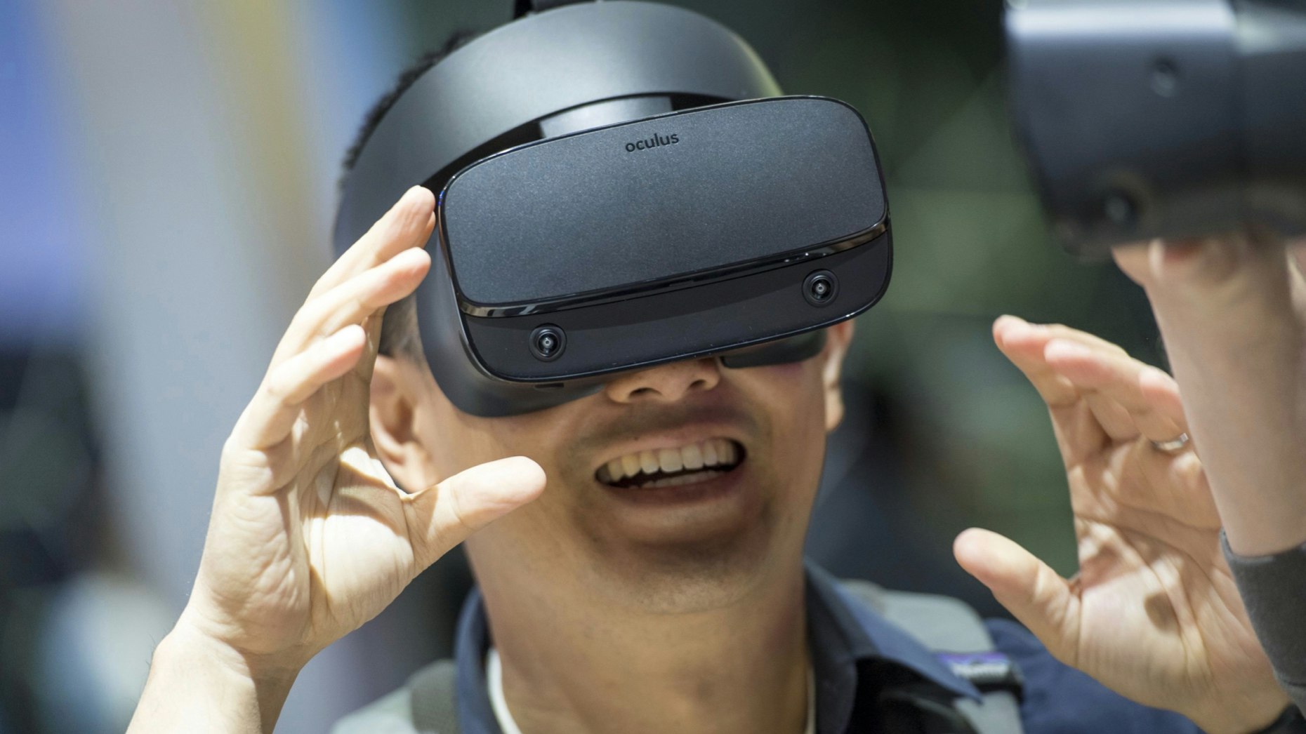 An attendee at a Facebook virtual reality event last year. Photo by Bloomberg
