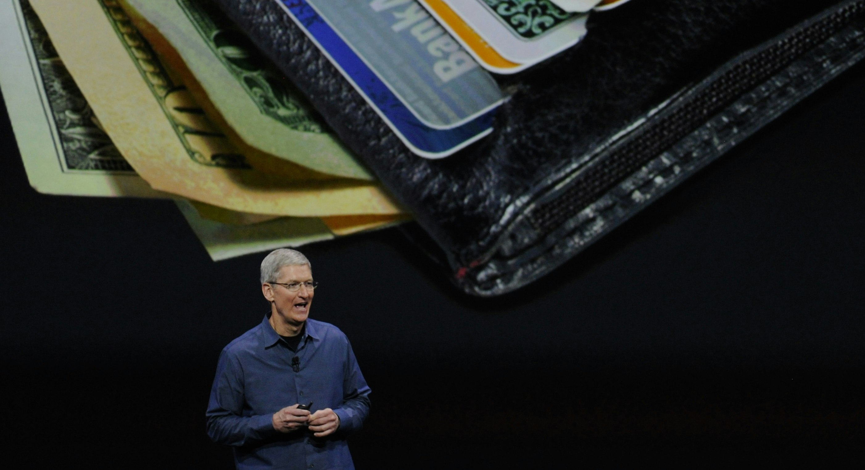 Apple CEO Tim Cook announcing Apple Pay. Photo by Bloomberg.