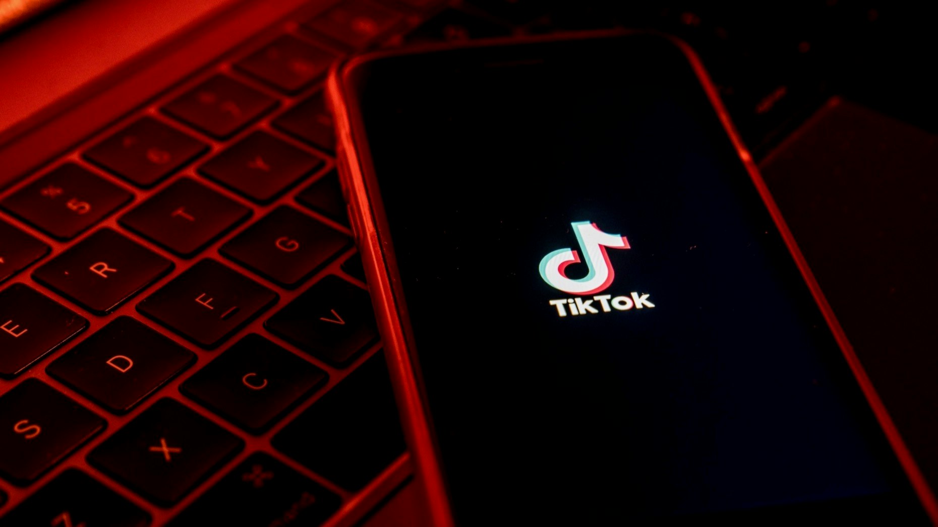 The logo of TikTok on a smartphone. Microsoft is in talks to buy TikTok, The Information confirmed. Photo: Bloomberg.