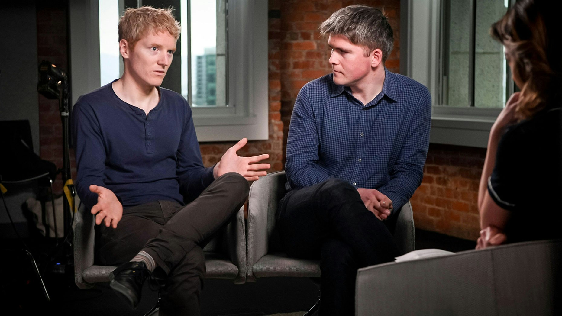Patrick Collison, CEO and co-founder of Stripe, left, and John Collison, president and co-founder of Stripe, in 2018. Photo by Bloomberg.