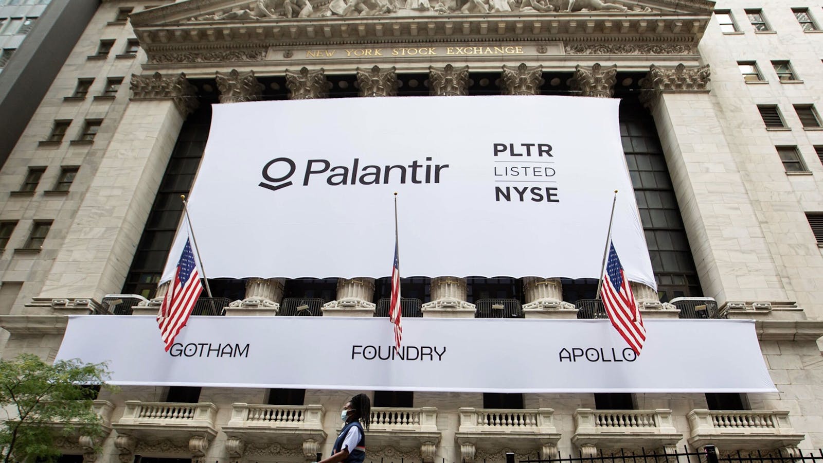 Palantir's sign hangs from the front of the New York Stock Exchange today. Photo by Bloomberg