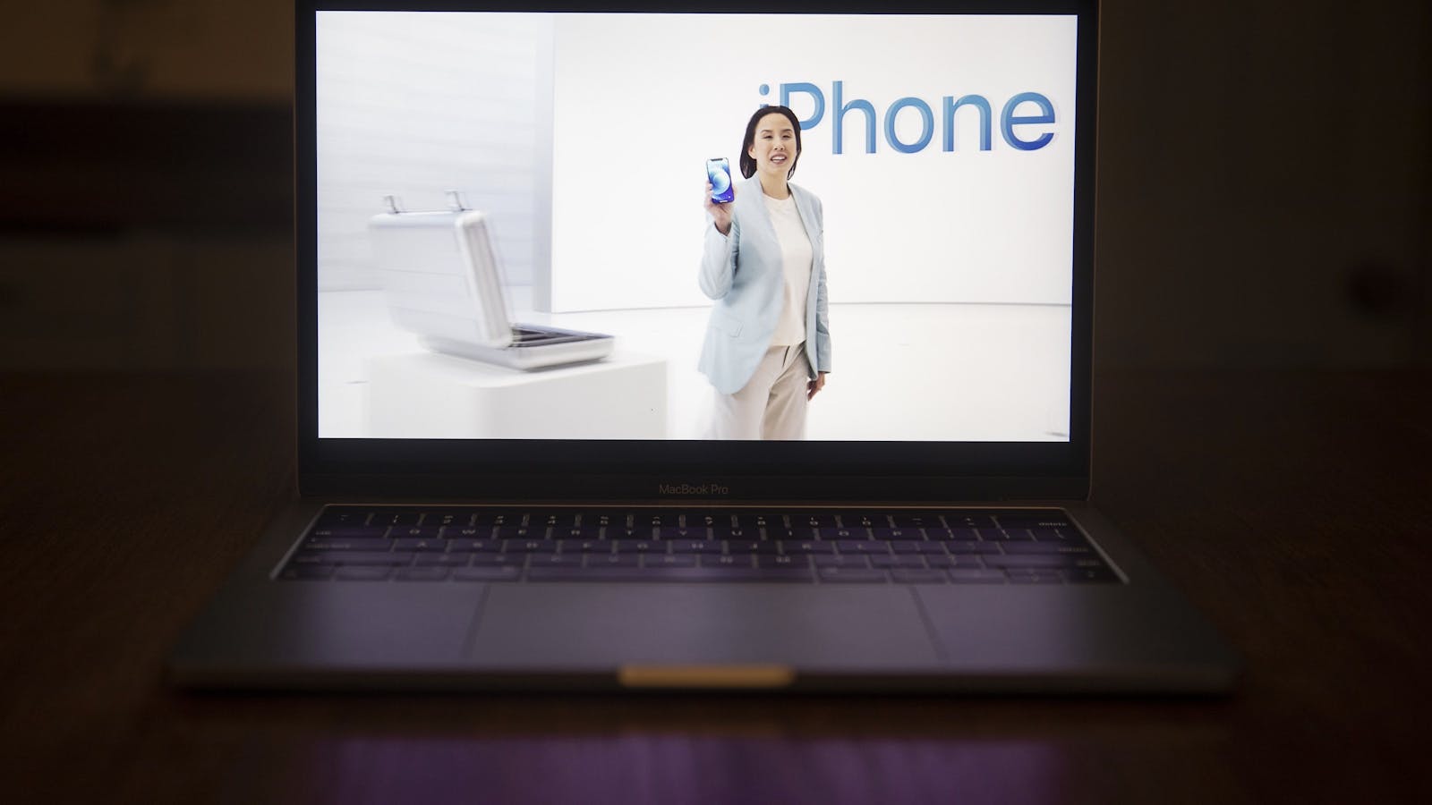 Kaianne Drance, vice president of iPhone product marketing at Apple Inc., showing off one of Apple's new iPhones on Tuesday. Photo by Bloomberg