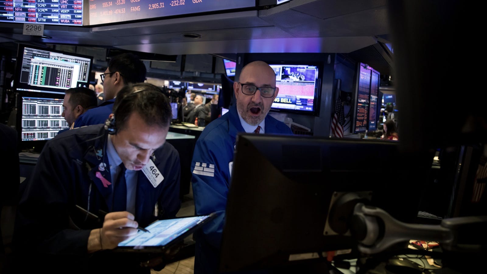 Traders on the floor of the New York Stock Exchange in March. Photo by Bloomberg