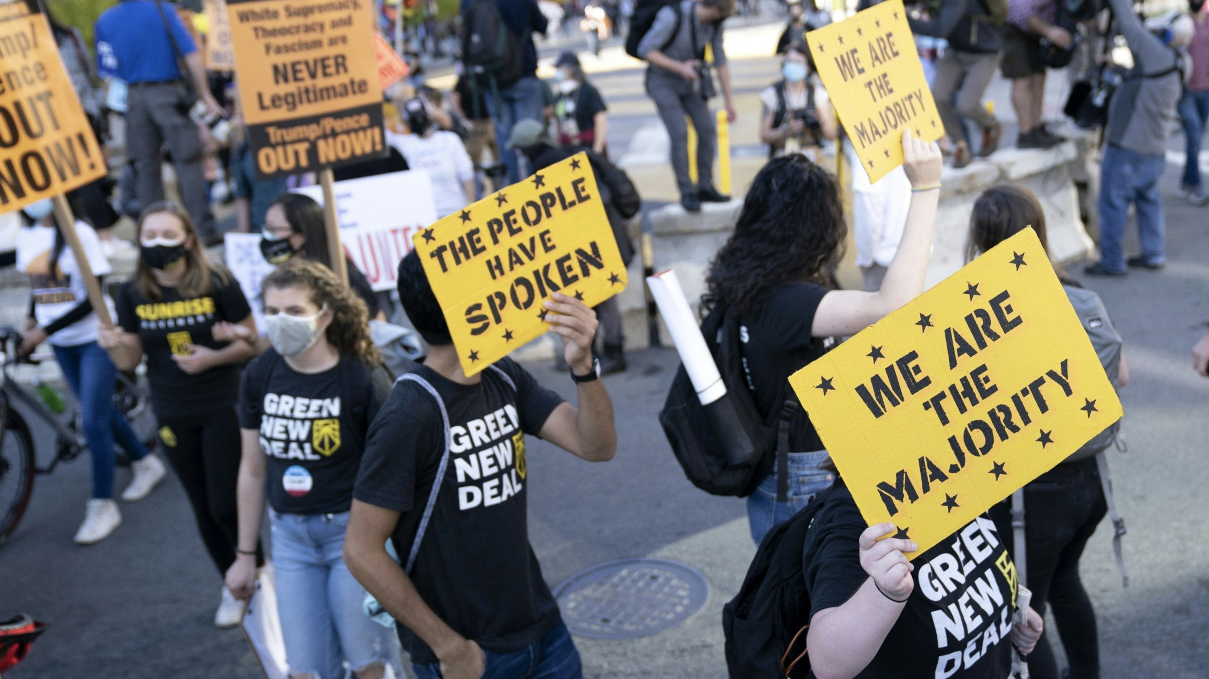 Election count demonstrators marching in Washington on Friday. Photo by Bloomberg.