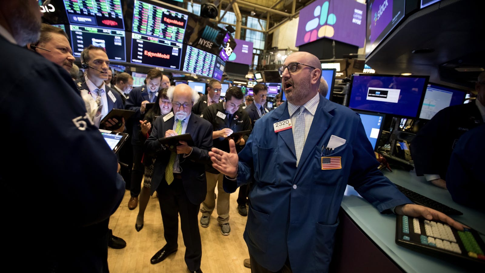Traders on the floor of the New York Stock Exchange. Photo by Bloomberg
