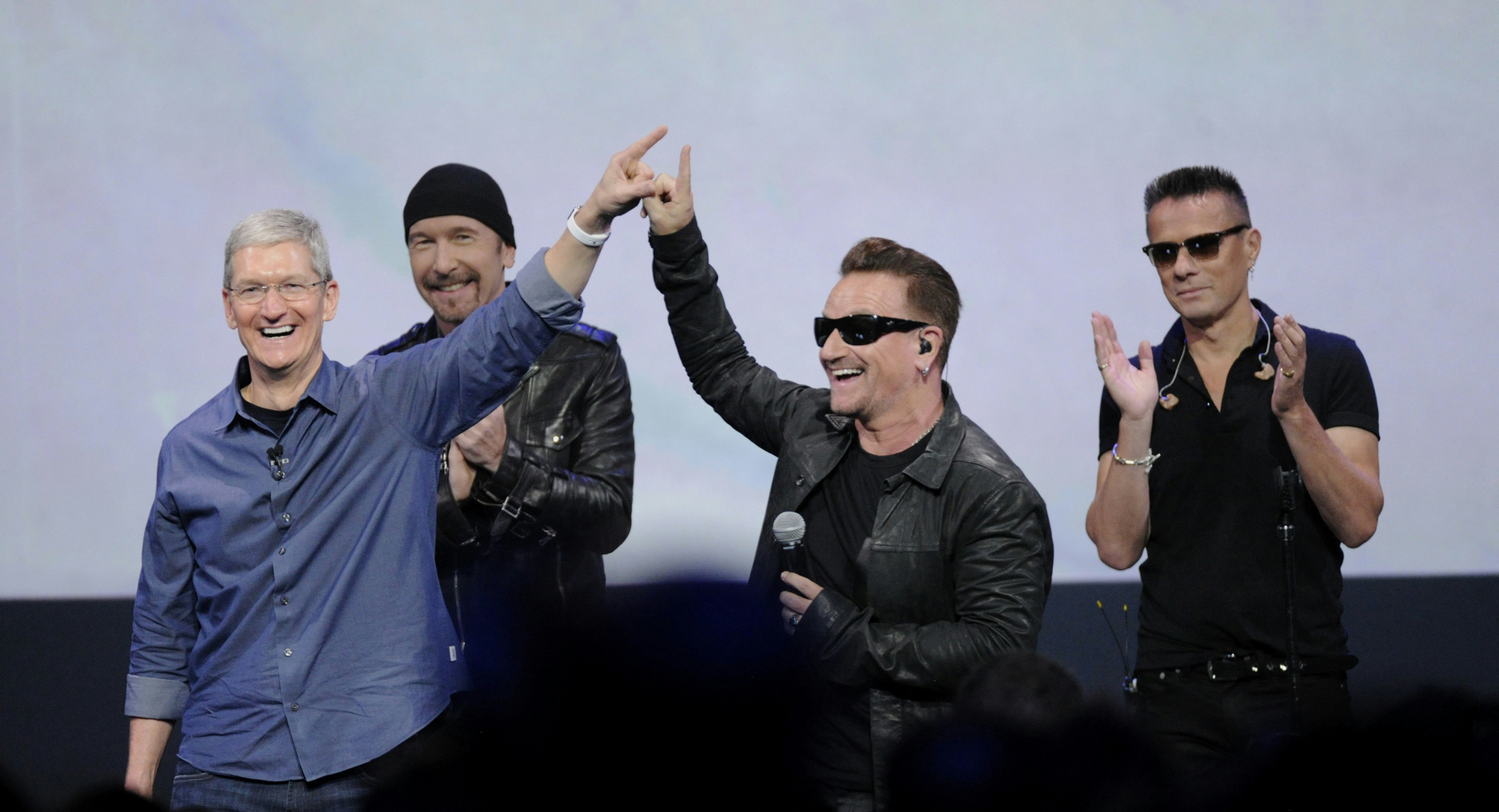 Apple CEO Tim Cook with U2. Photo by Bloomberg.