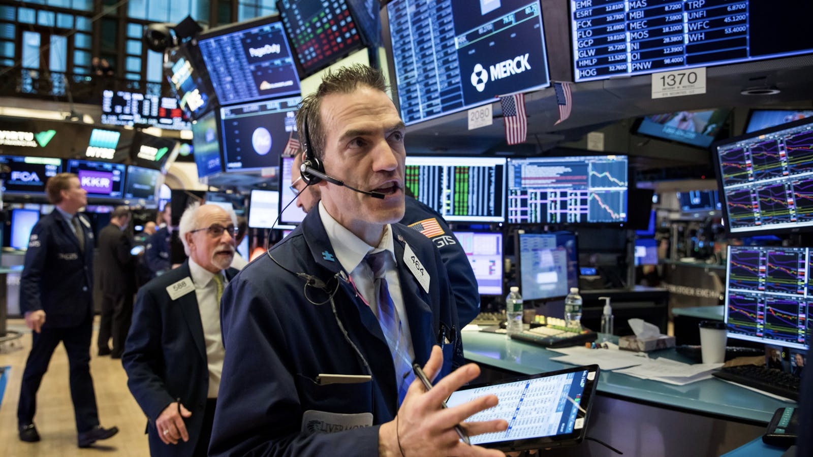 Traders on the floor of the New York Stock Exchange. Photo by Bloomberg