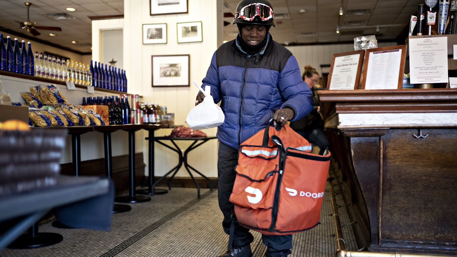 A DoorDash delivery person. Photo by Bloomberg