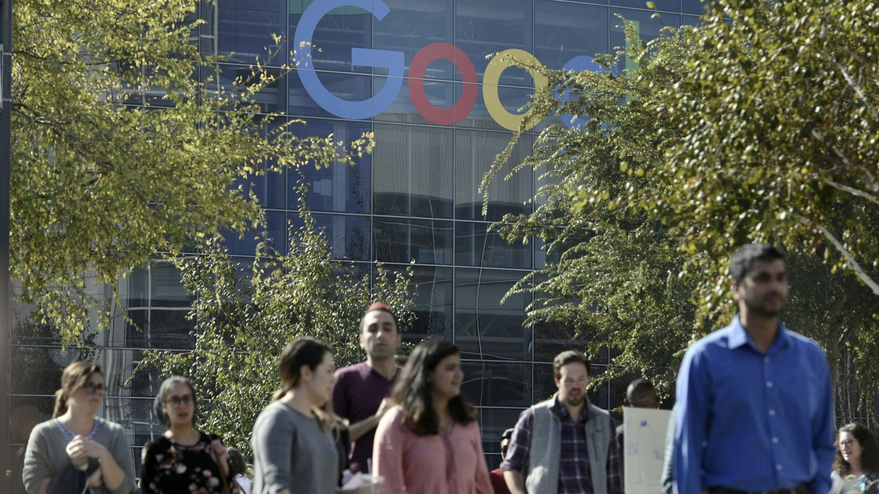 Google workers protesting in a 2018 walkout over how the company handled sexual harassment allegations against a senior executive. Photo by Bloomberg