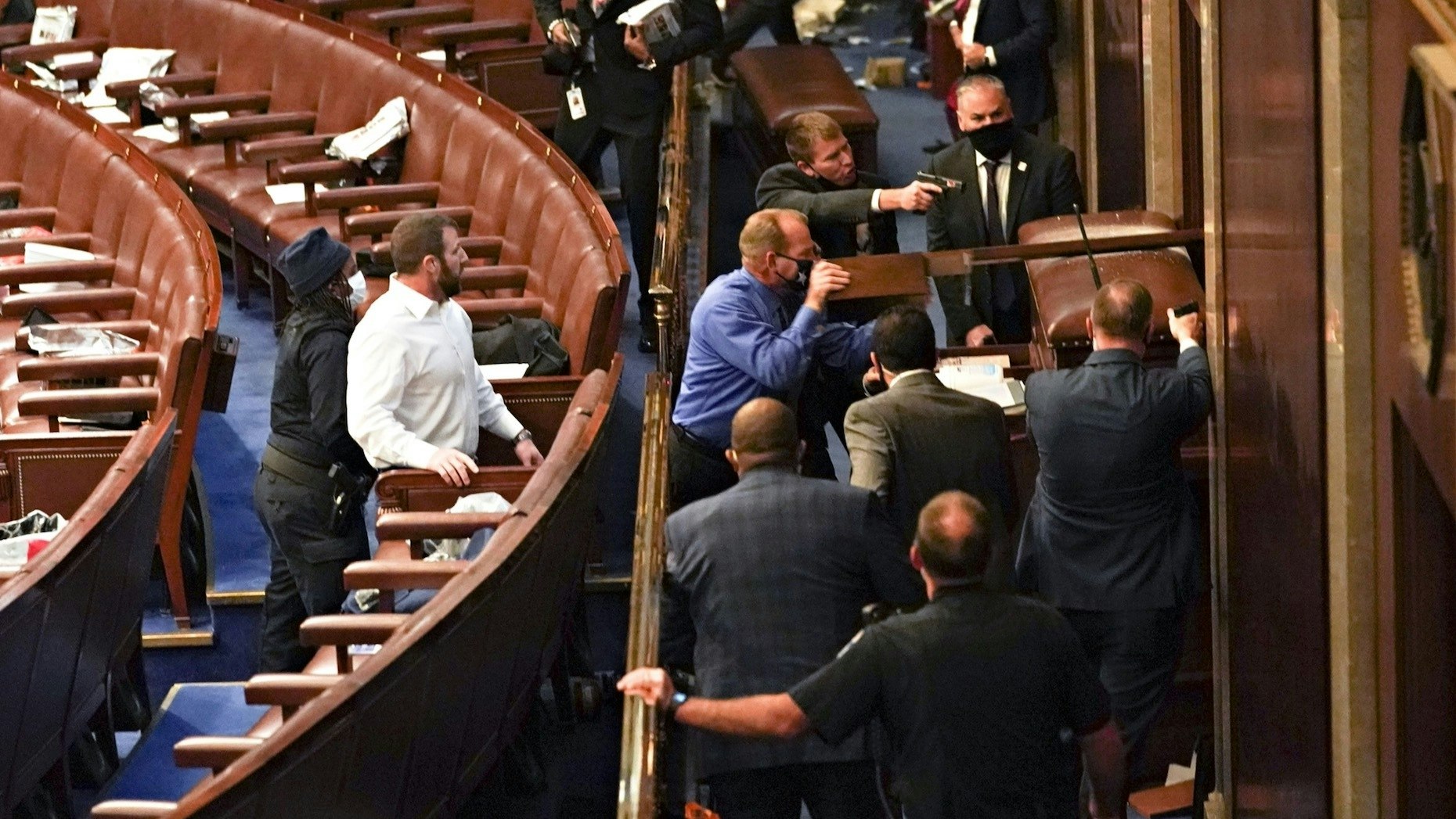 Guards at the U.S. capitol try to stop pro-Trump mob from entering a joint session of Congress on Wednesday. Credit: Bloomberg
