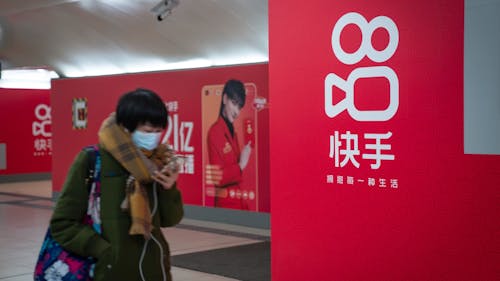 A Kuaishou ad in Beijing. Photo by Bloomberg.
