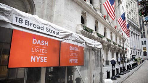 DoorDash signs outside the New York Stock Exchange at the time of its IPO in December. Photo by Bloomberg.