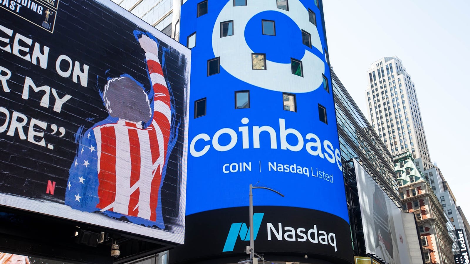 Coinbase signage at the Nasdaq in New York. Photo by Bloomberg.