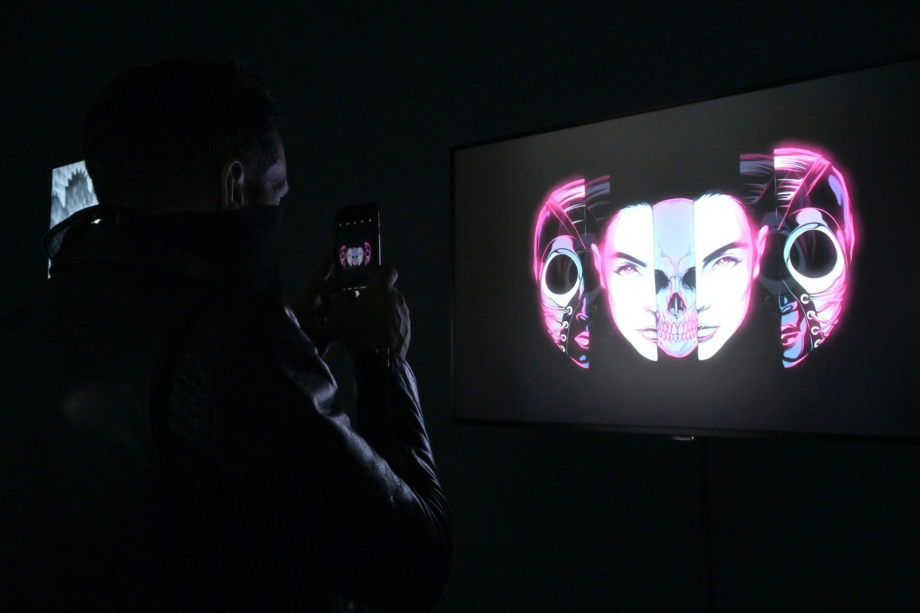 A screen displays a NFT, or non-fungible token, work of art in New York on April 10. Photo: AP