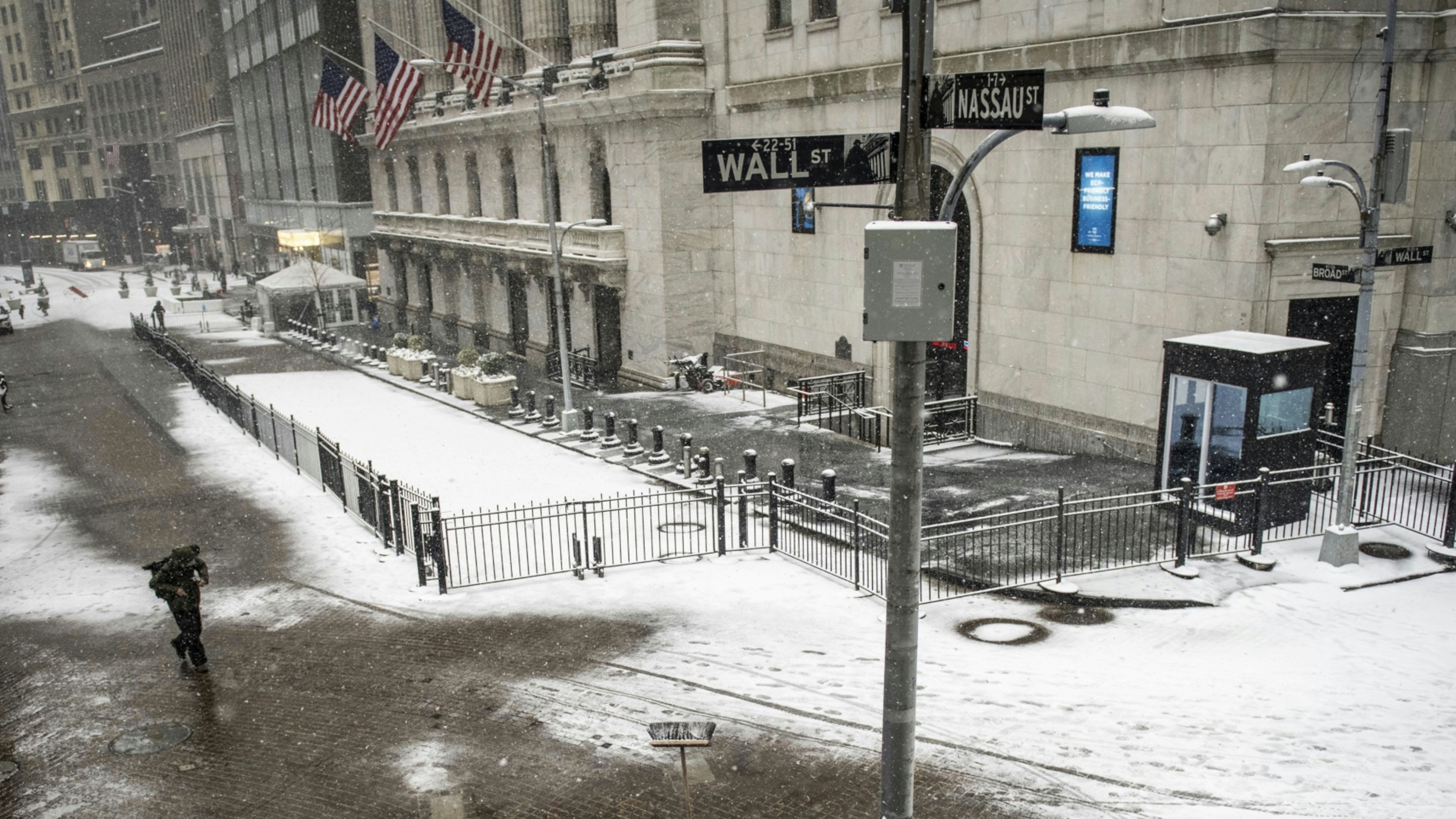 The New York Stock Exchange during a winter storm. Photo by Bloomberg