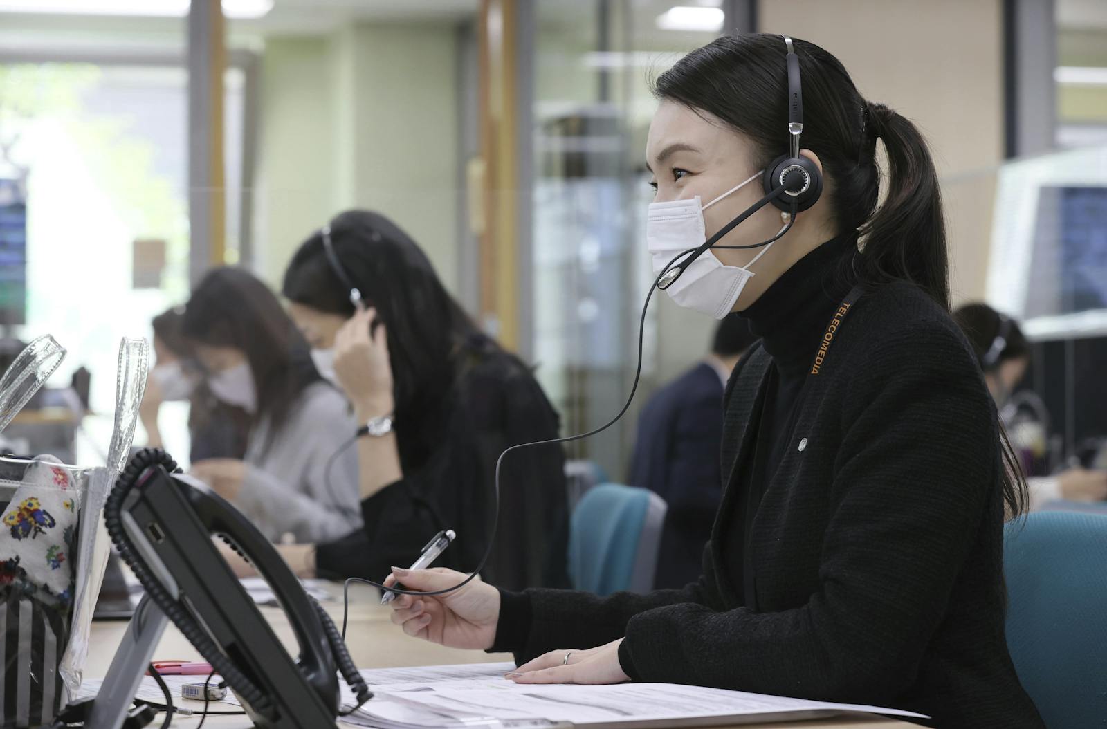 Employees at Japan's JAL answer phone calls. The need to support off-premise call center employees during the pandemic boosted demand for companies such as Talkdesk. Photo: Yomiuri Shimbun via AP Images