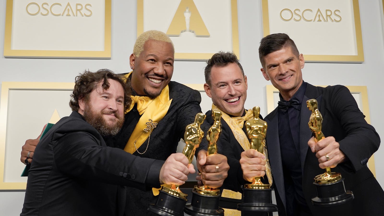Producers of Group Nine's short film "Two Distant Strangers" at the Oscars. Photo by AP.