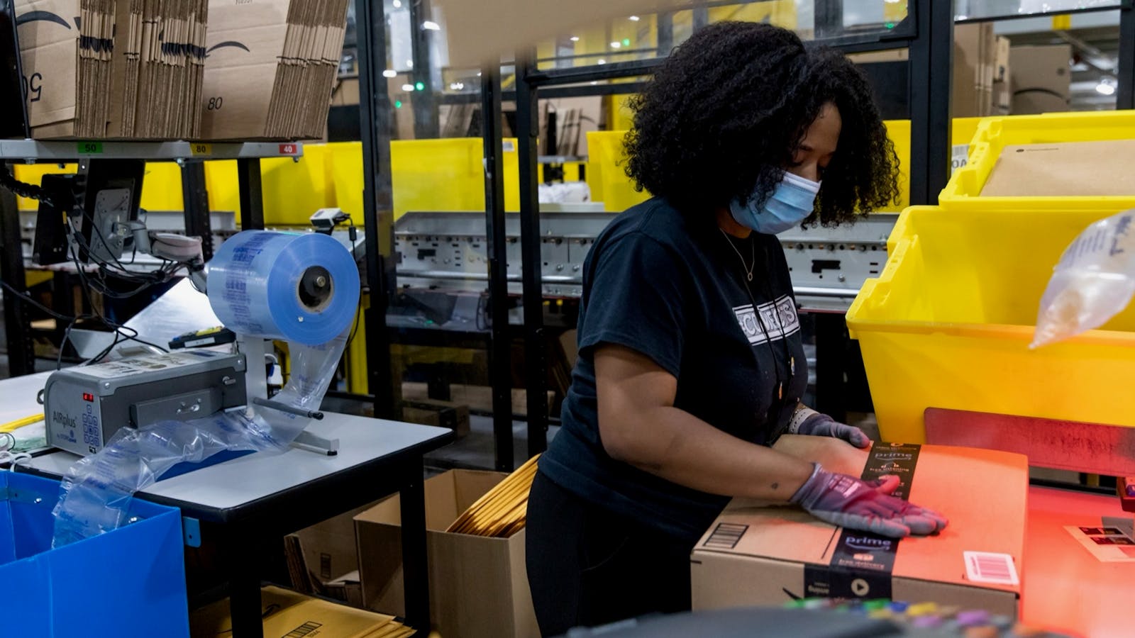 An Amazon worker at a company warehouse in Raleigh, North Carolina, in June. Photo by Bloomberg