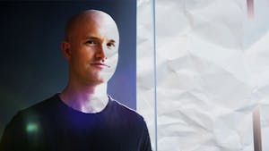 Coinbase CEO Brian Armstrong. Photo by Bloomberg. Art by Mike Sullivan. 