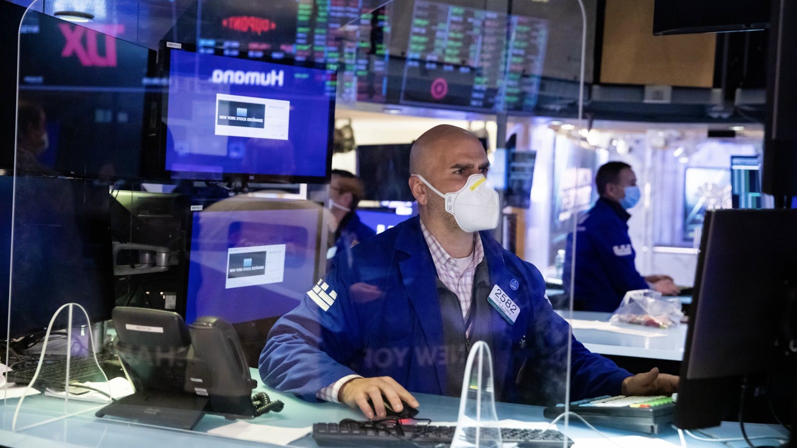 A trader on the floor of the New York Stock Exchange. Photo by Bloomberg