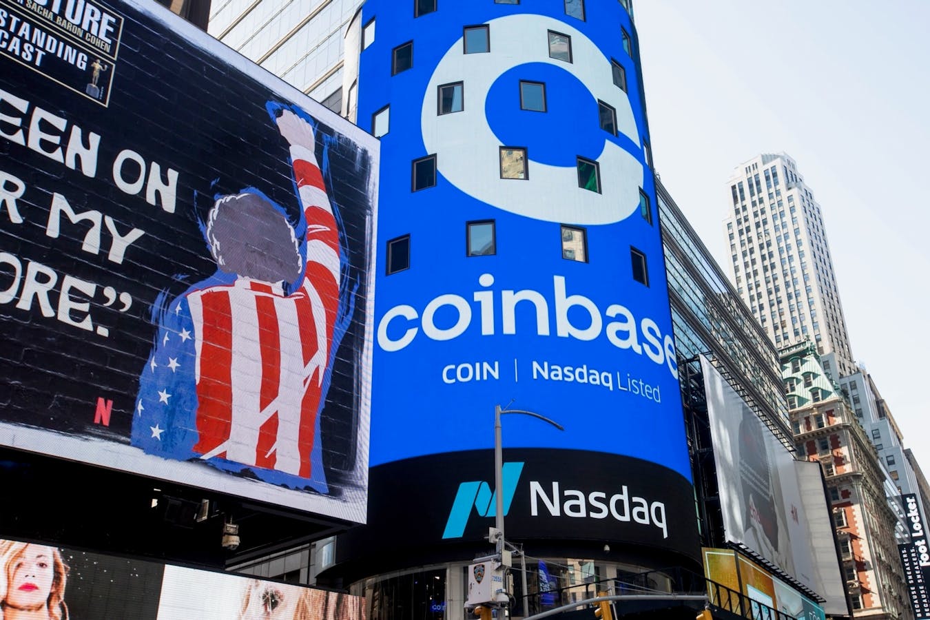 A Coinbase sign in New York at the time of its April direct listing. Photo: Bloomberg