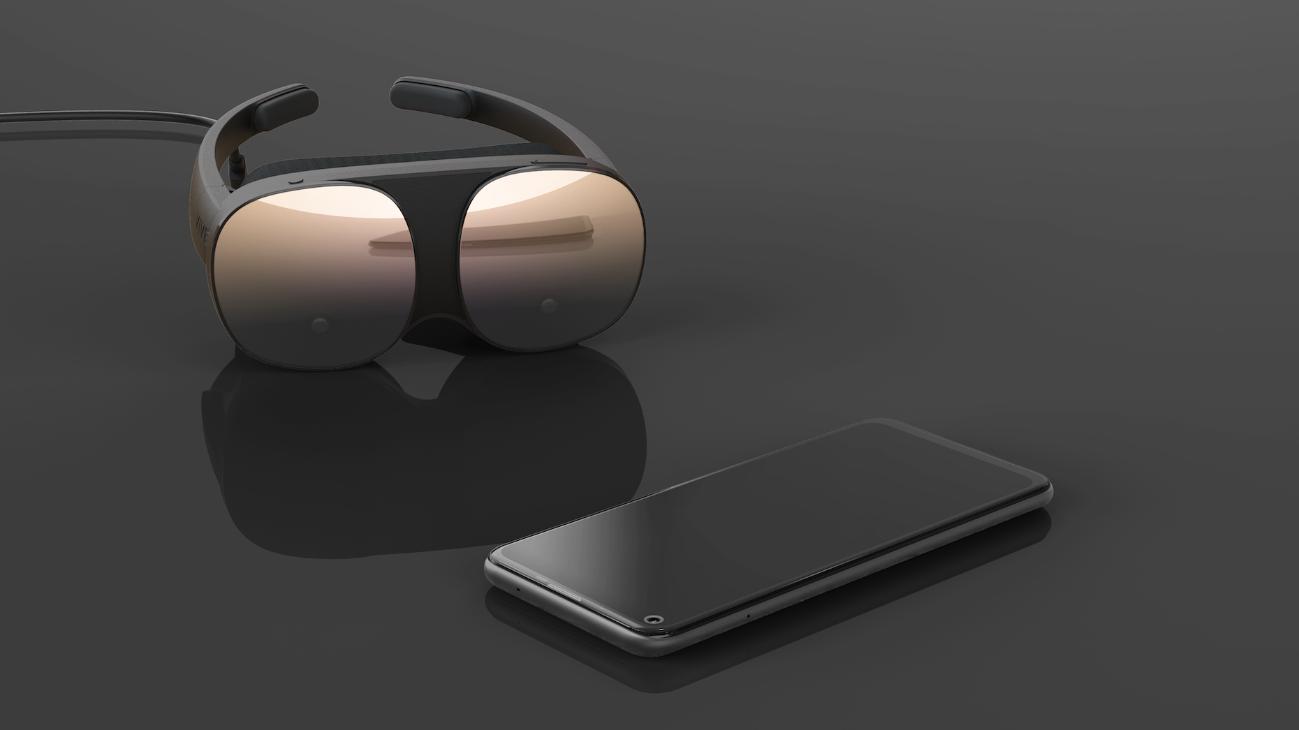 A Vive Flow headset next to a smartphone. Credit: HTC.