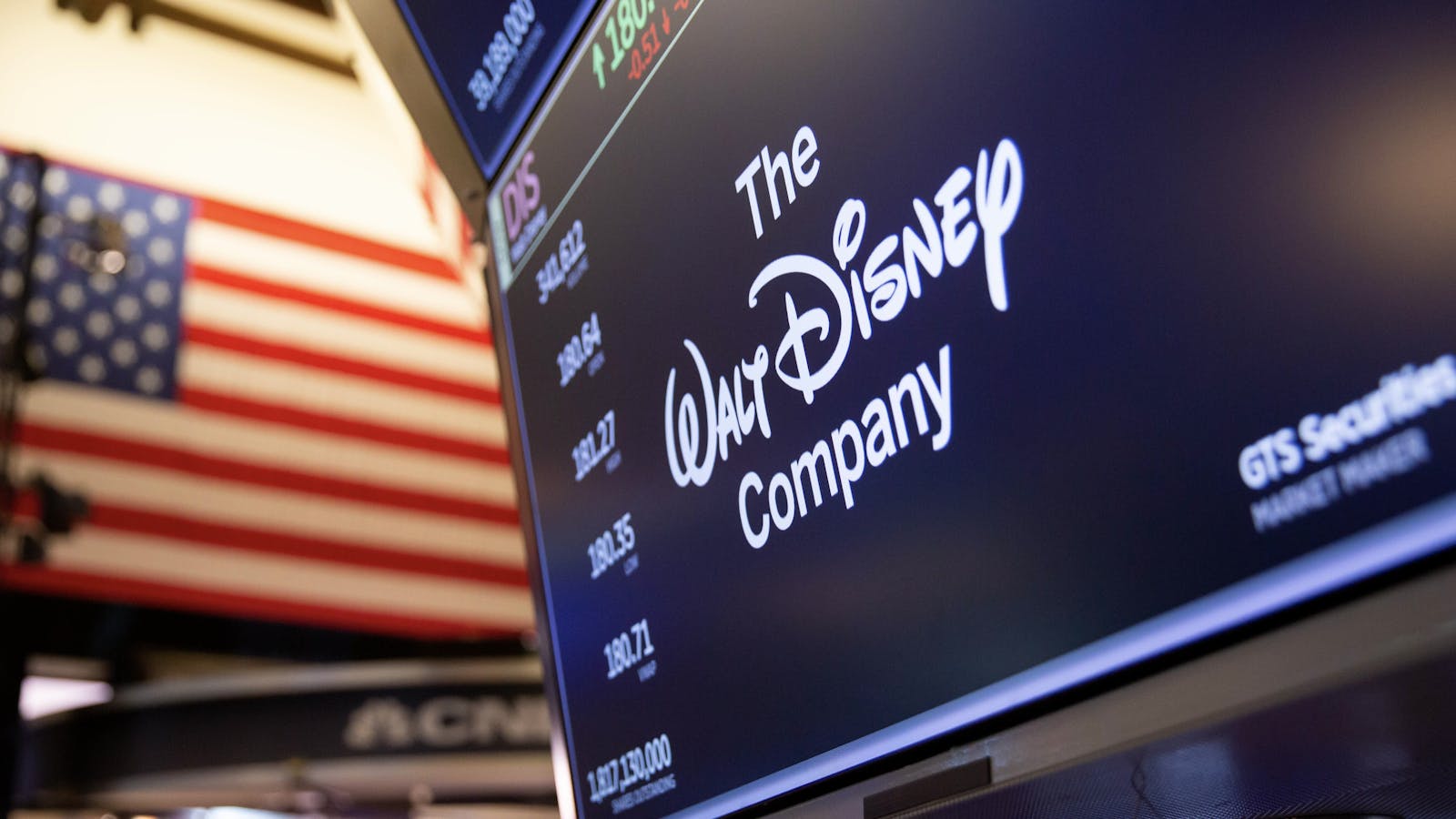 Disney's name on a screen at the New York Stock Exchange. Photo by Bloomberg.