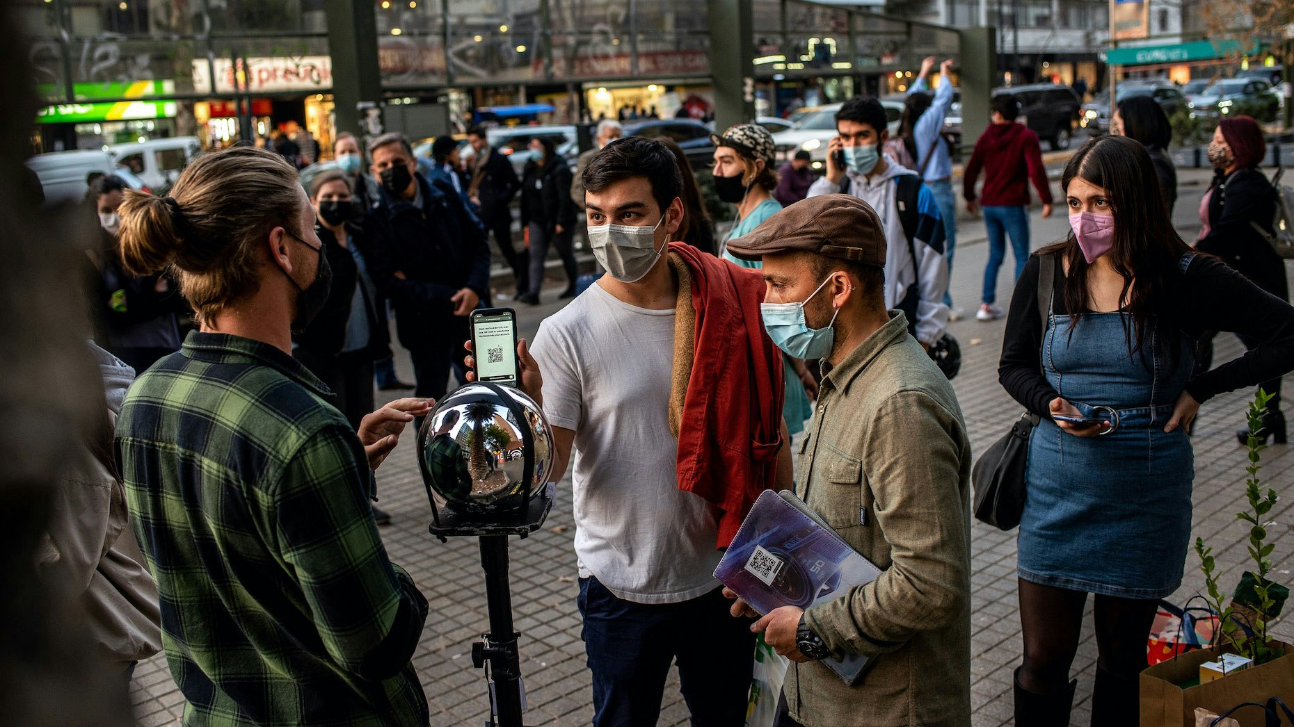 A photo of Worldcoin operators and the orb device in Chile. Photo: Worldcoin.