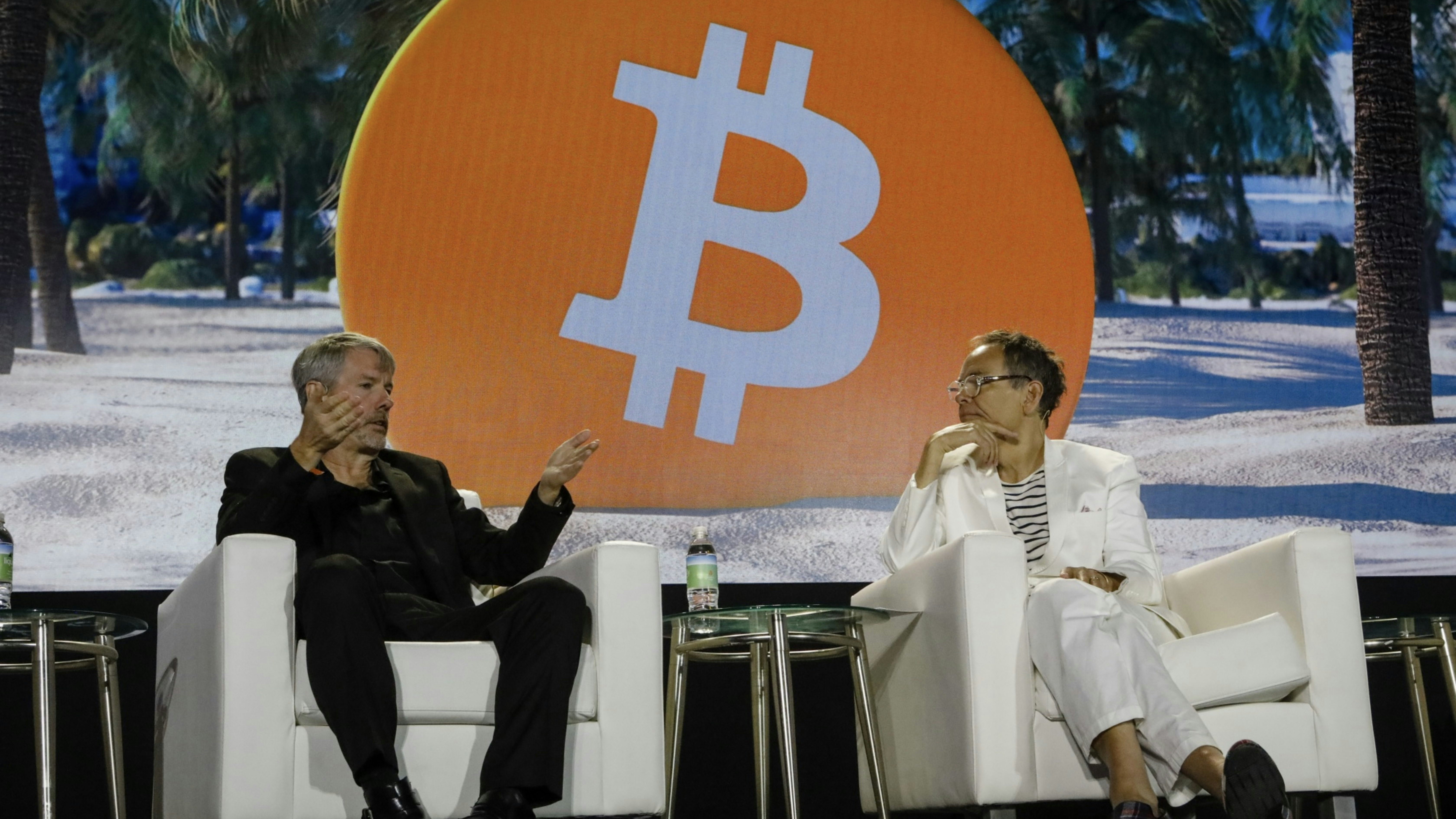 Microstrategy chairman Michael Saylor, on the left, at a bitcoin conference last year. Photo by Bloomberg.