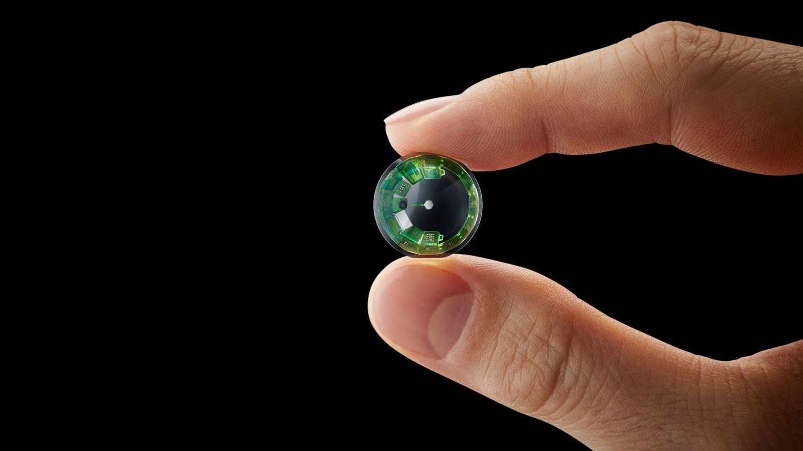 The new prototype from Mojo, a hard contact lens with a display, sensors, radio, and batteries. Photo: Mojo Vision.