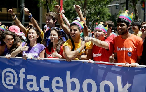 Facebook employees and family members march during the 44th annual San Francisco Gay Pride parade Sunday, June 29, 2014, in San Francisco.