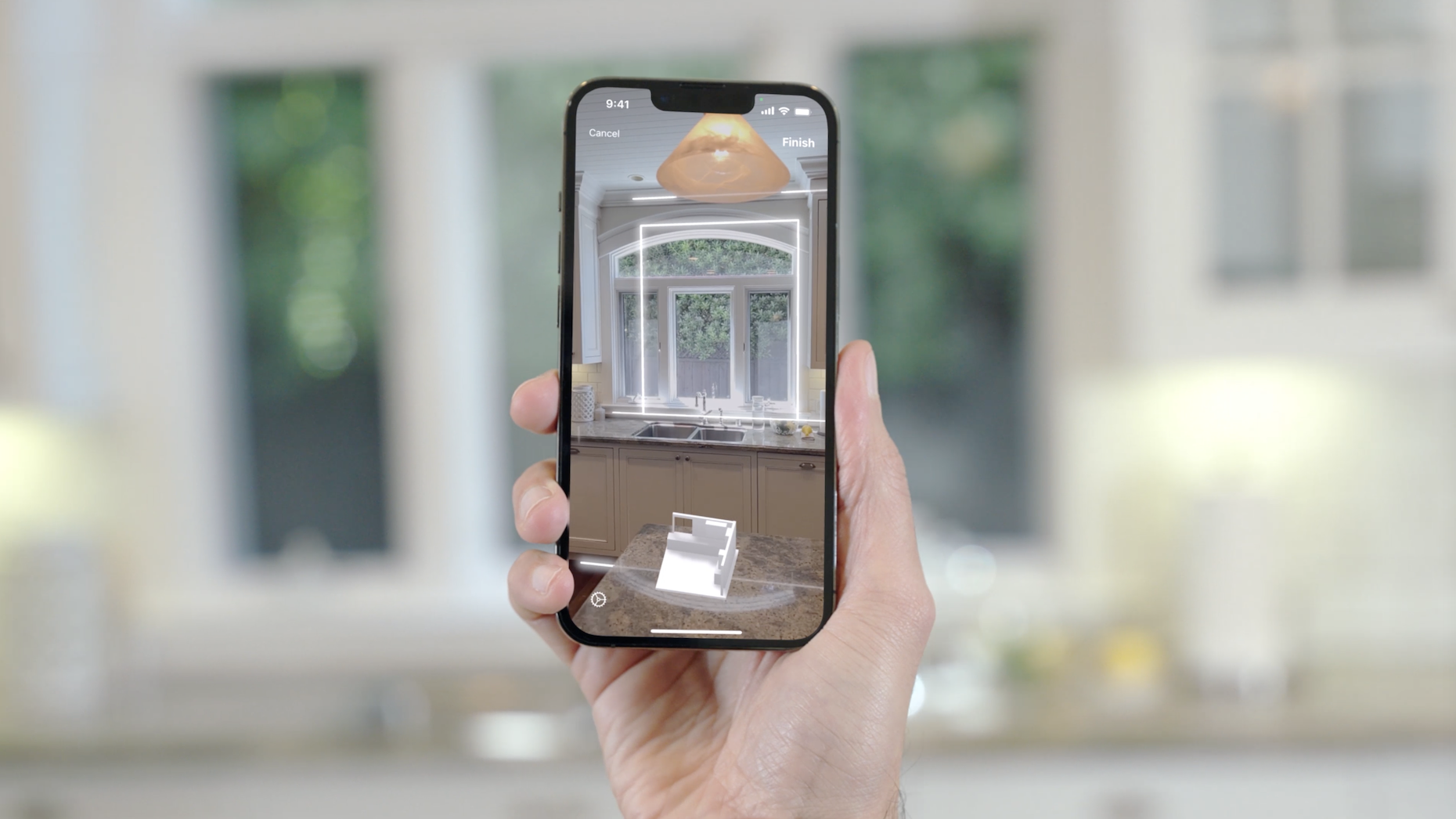 The RoomPlan scanning process on an iPhone. Photo: Apple.