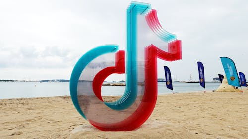 TikTok's logo on the beach at Cannes this week. Photo by Reuters.
