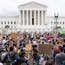 Protesters at the Supreme Court today. Photo by AP
