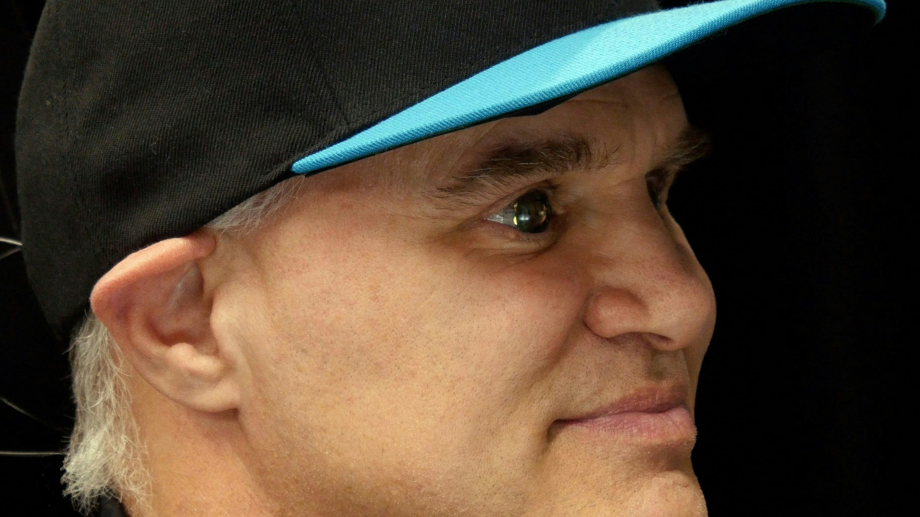 Mojo Vision CEO Drew Perkins wearing an AR contact lens prototype. Credit: Mojo Vision.