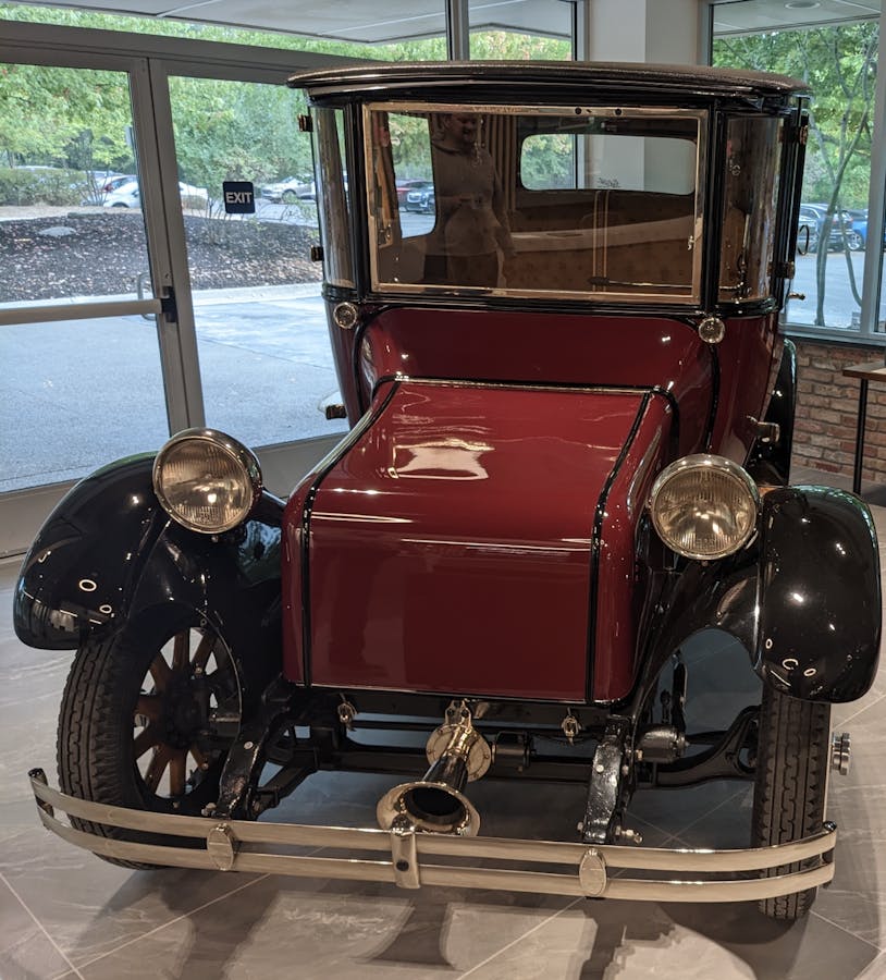 From the first electric vehicle era: The 1922 Detroit Electric Model 90, in the lobby of Our Next Energy, could go up to 50 miles on a charge. Photo: The Electric 