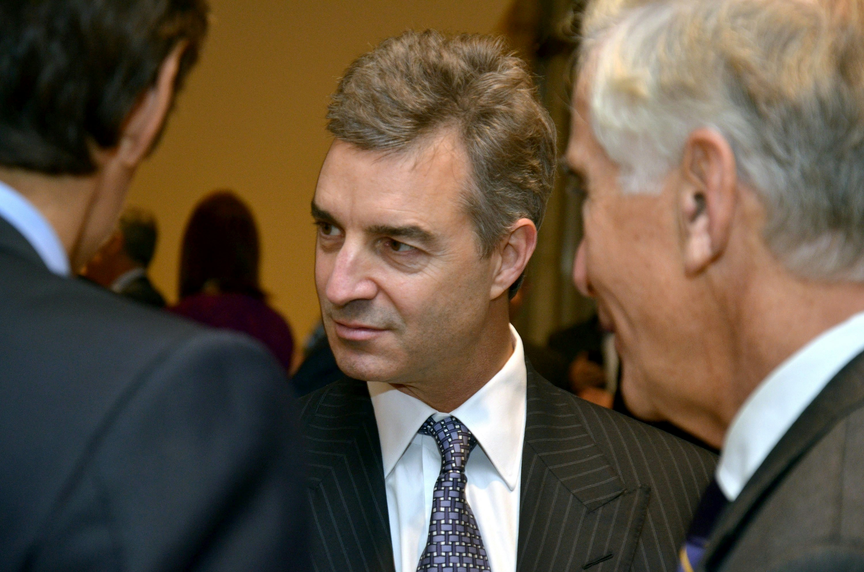 Dan Loeb, center, of Third Point. Photo by Bloomberg.