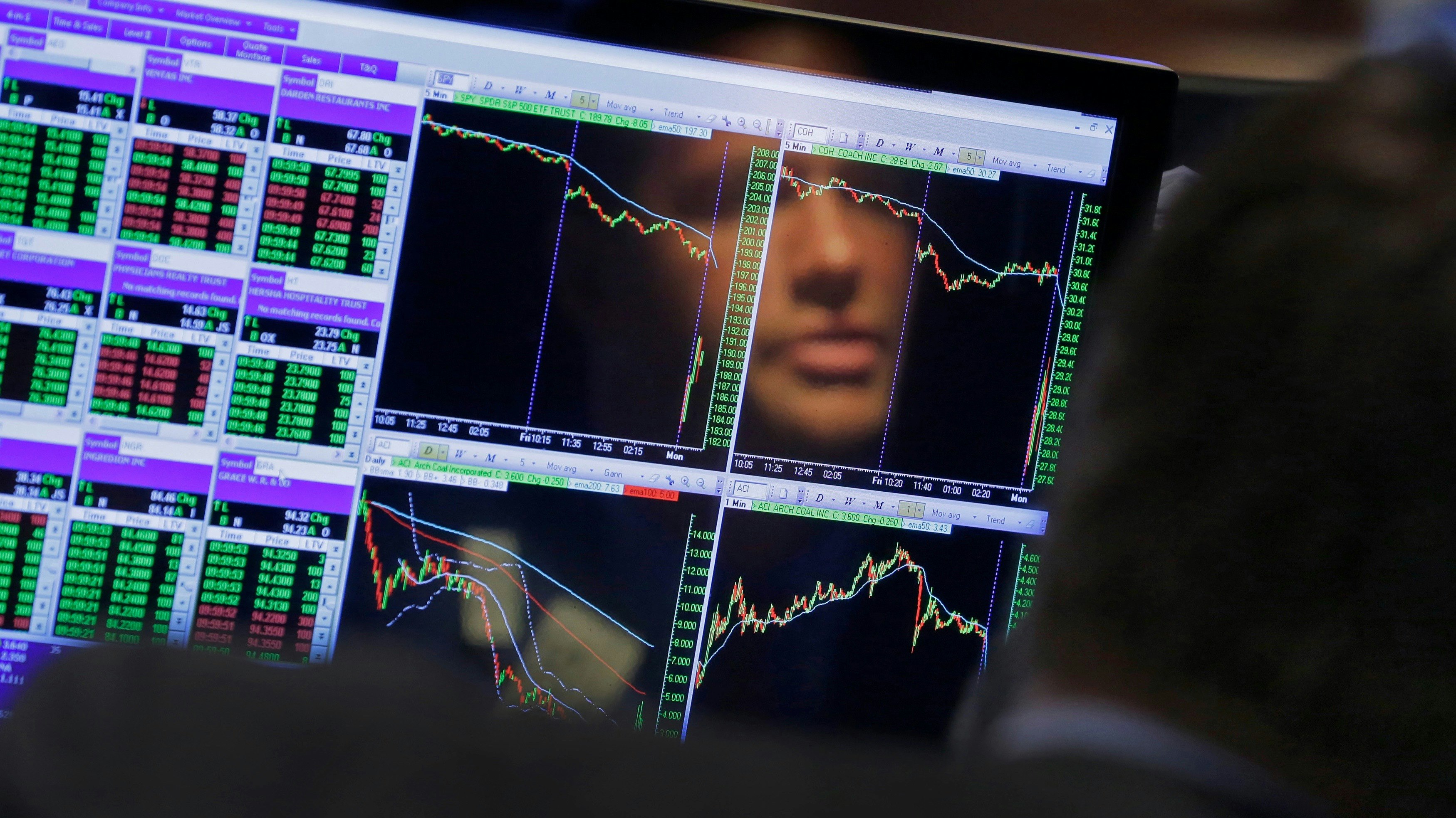 A New York Stock Exchange specialist. Photo by AP.